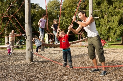 Children climbing at a playground in Kannenfeldpark.